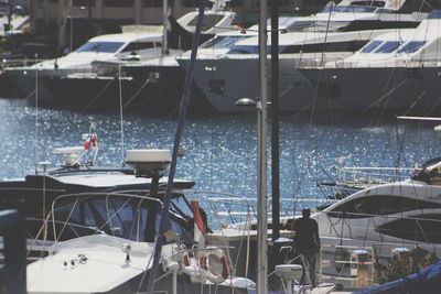 Boats moored at harbor