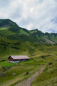 Scenic view of landscape and mountains against sky