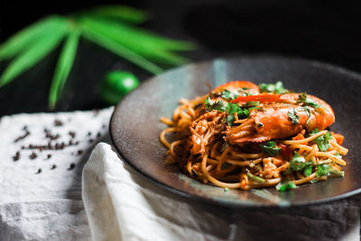 Close-up of noodles in bowl on table