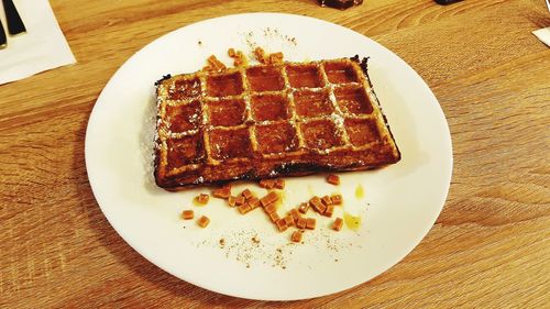 High angle view of cake in plate on table