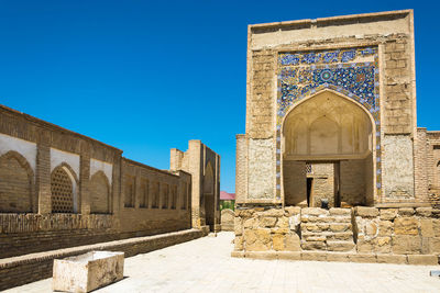 View of historical building against clear blue sky