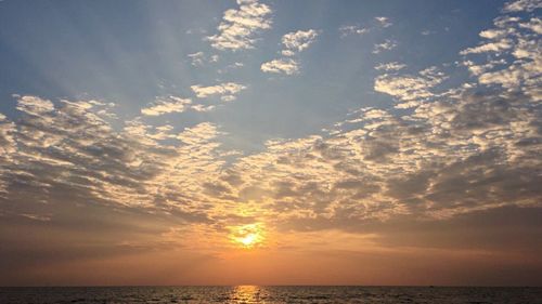 Scenic view of sea at sunset