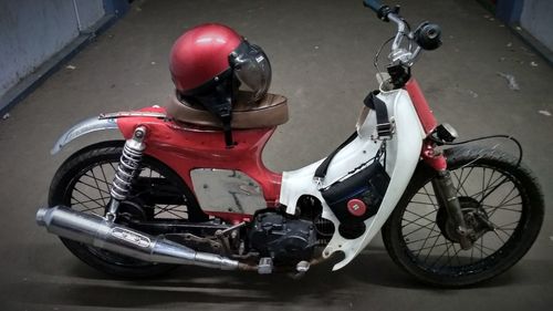 Close-up of motorcycle on road