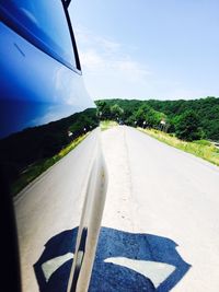 Road amidst landscape against sky