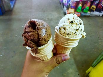 Cropped hand of person holding ice cream