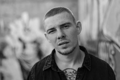 Portrait of young man outdoors