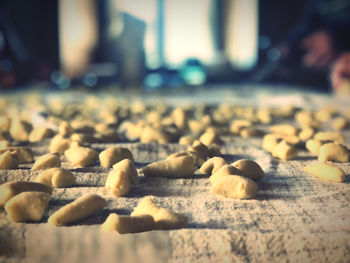 Close-up of stones on street in city