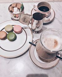 High angle view of coffee cup on table