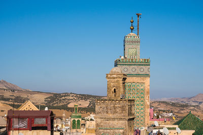 Tower of building against blue sky