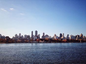 Sea with city in background