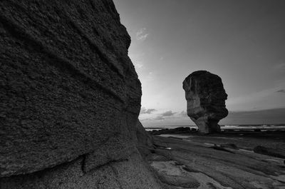 Scenic view of rock formation against sky