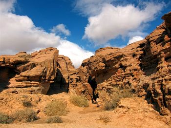 Panoramic view of rock formations against sky