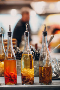 Close-up of wine bottles on table