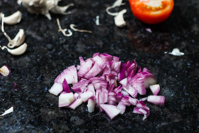High angle view of pink flowers on ground