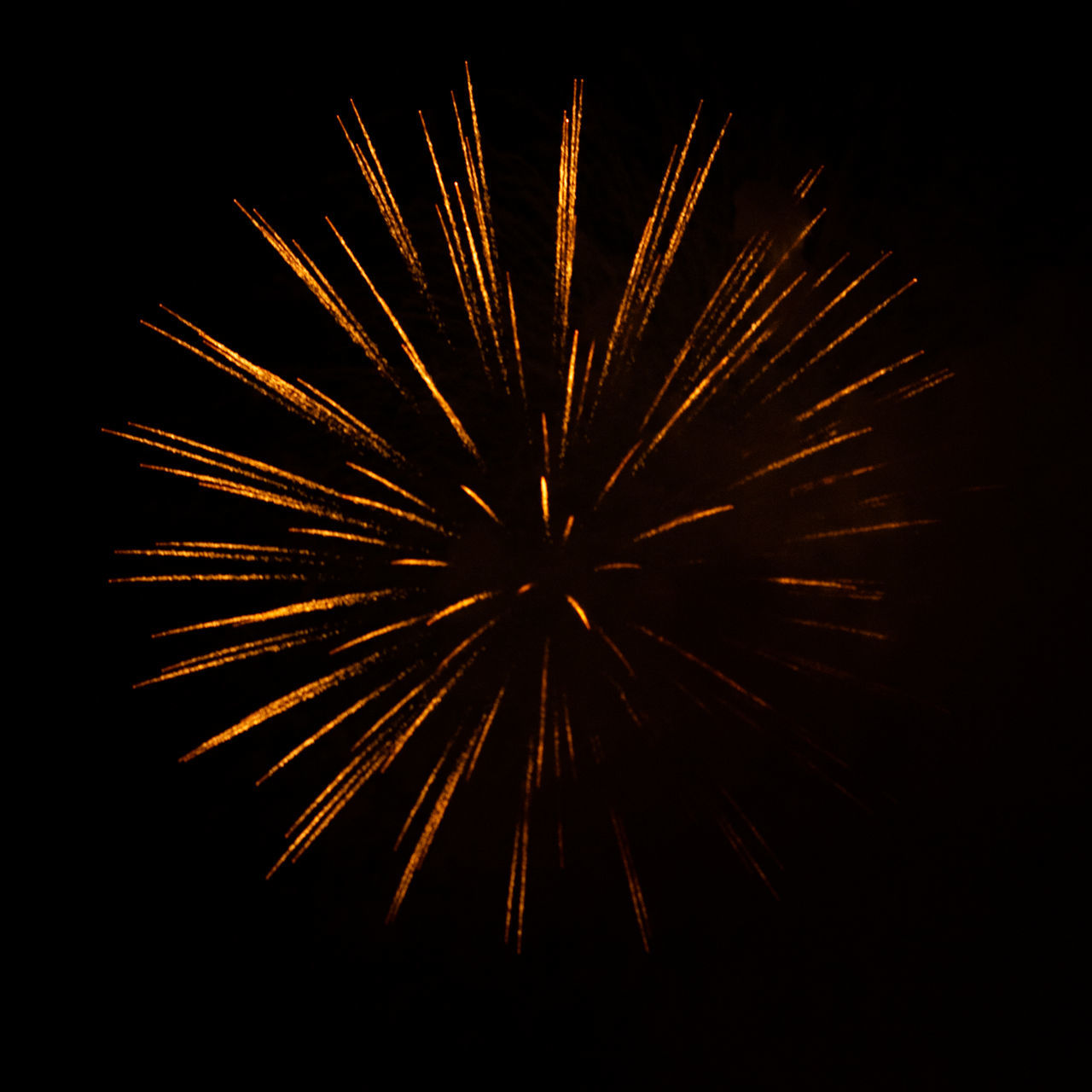 fireworks, exploding, celebration, event, firework display, motion, night, arts culture and entertainment, illuminated, no people, recreation, firework - man made object, glowing, sky, nature, black, blurred motion, long exposure, dark, burning, new year's eve, multi colored, outdoors