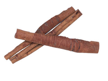 Low angle view of broken wooden structure against white background