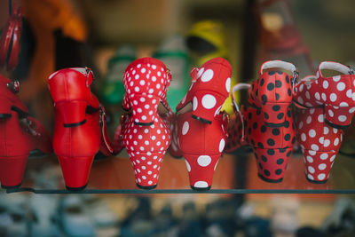 Close-up of red high heels for sale in shop