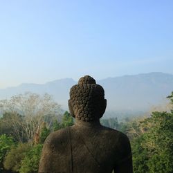 Statue on buddha against clear sky