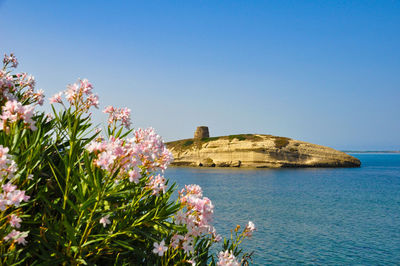 Scenic view of sea against blue sky