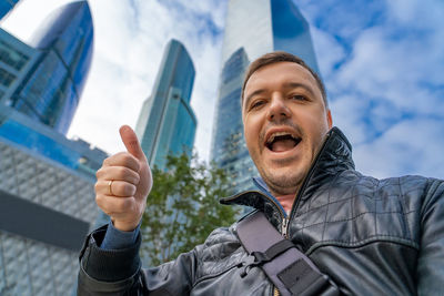 Portrait of man using mobile phone