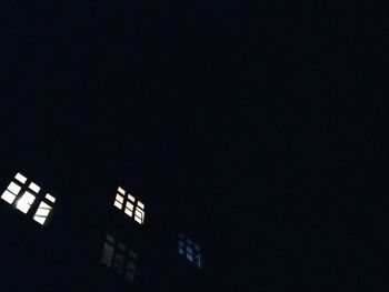 Low angle view of building against sky at night