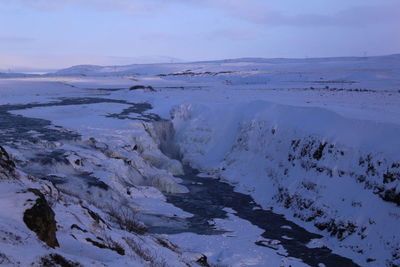 Scenic view of frozen sea against sky