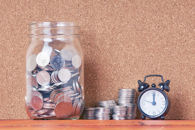 Close-up of clock against black background