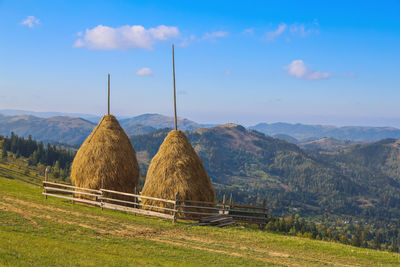 Haystack mountain was shot in a bright, sunny day. mountains visible to the horizon.