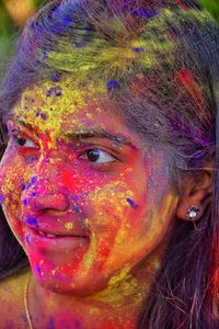 Close-up portrait of a serious young woman