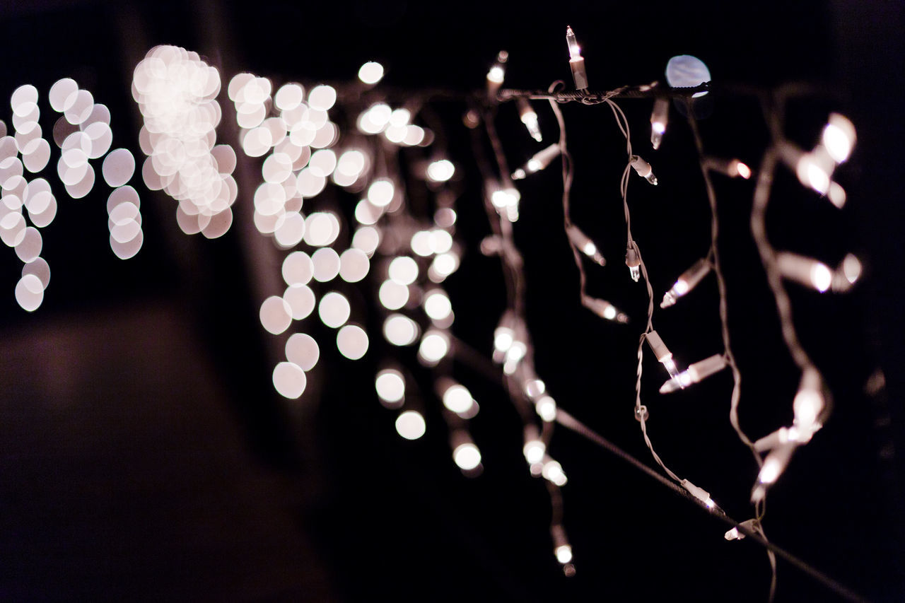 CLOSE-UP OF ILLUMINATED LIGHTING EQUIPMENT