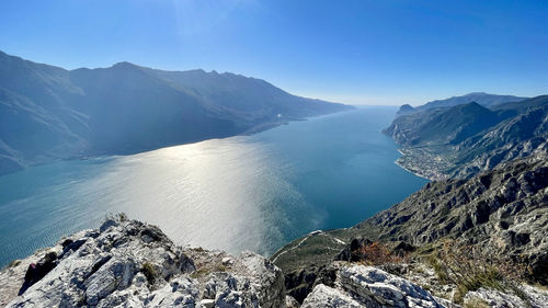 Scenic view of mountains against sky on sunny day