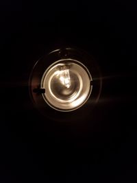 Close-up of illuminated light bulb