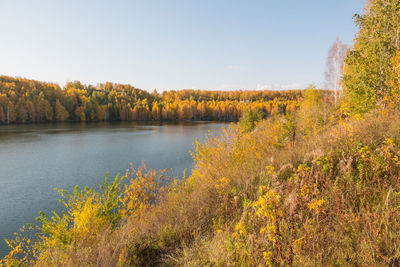 Scenic view of lake against sky during autumn