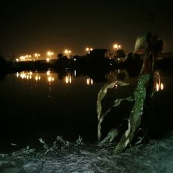 Illuminated fountain at night