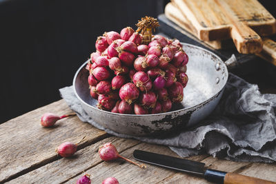 High angle view of strawberries in bowl on table