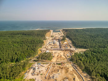 Scenic view of sea against sky, aerial view of canal construction in poland. 