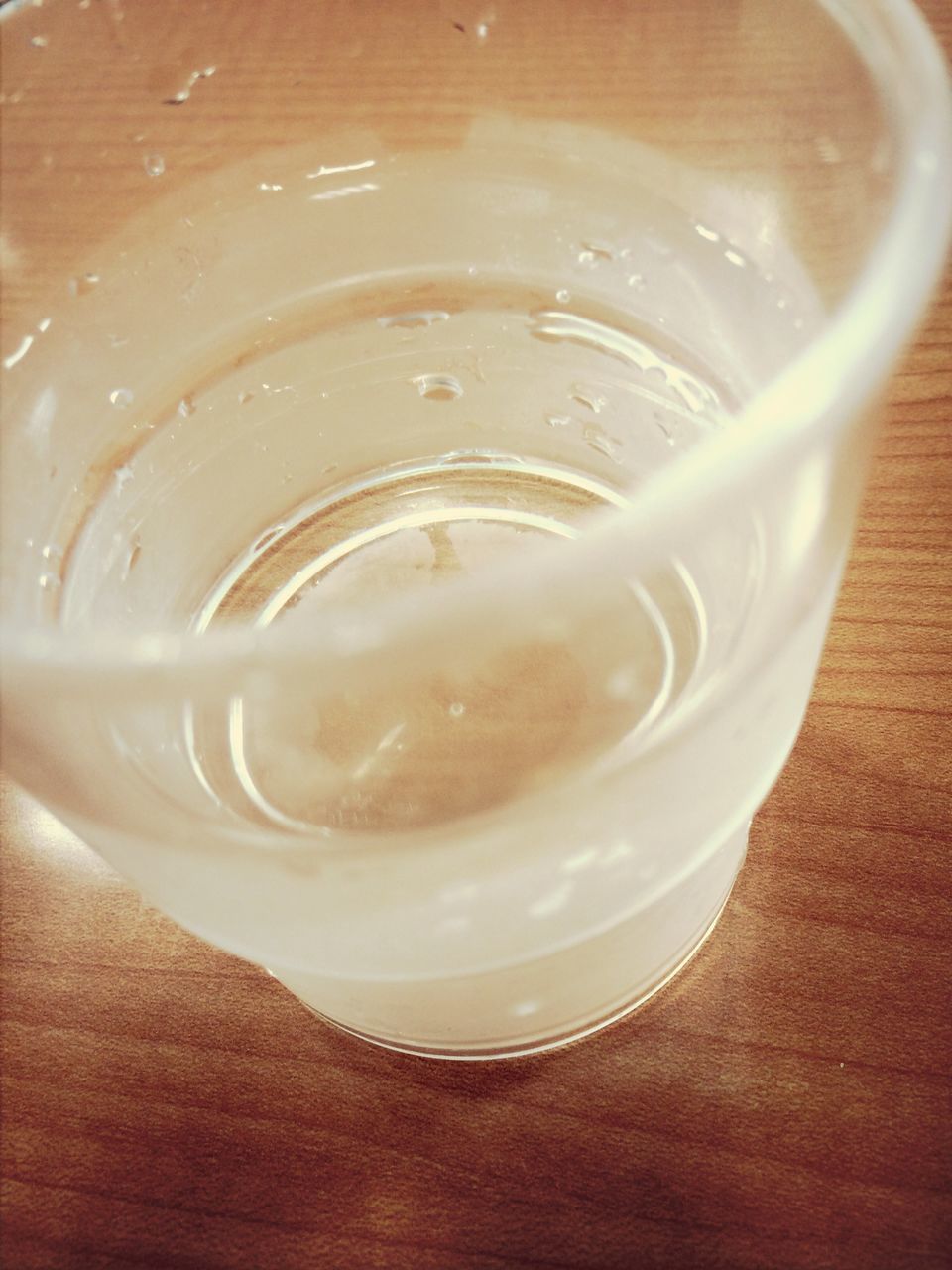 drink, refreshment, food and drink, freshness, indoors, table, coffee cup, still life, close-up, coffee - drink, frothy drink, drinking glass, high angle view, saucer, coffee, beverage, spoon, directly above, cup, water