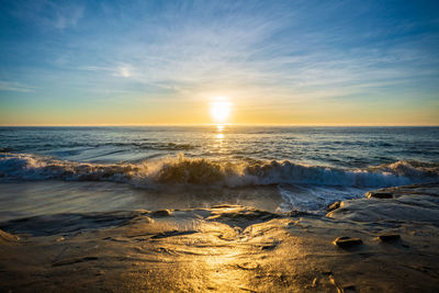 Scenic view of sea against sky during sunset