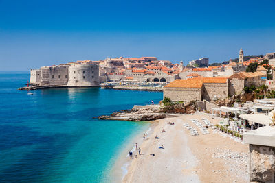 The beautiful banje beach and dubrovnik city