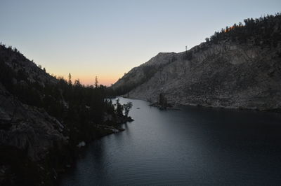 Scenic view of river against sky during sunset