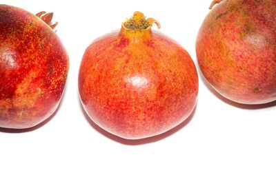 Close-up of apples on white background