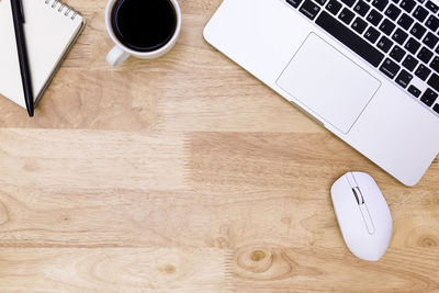 High angle view of coffee cup on table