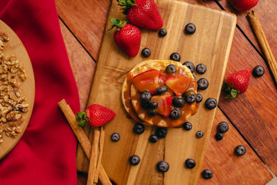 High angle view of strawberries on table