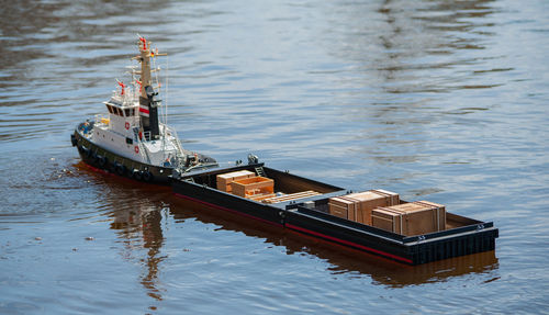 Remote controlled ship model is remote controlled on a lake