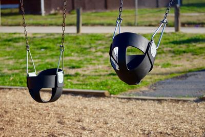 Close-up of swing in playground