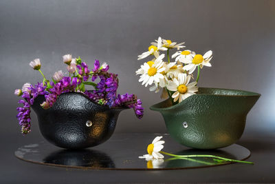 Close-up of flowers on table