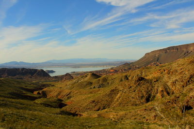 Scenic view of landscape against cloudy sky