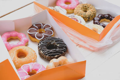 High angle view of dessert in box on table