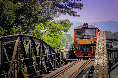 Train on railroad track against sky