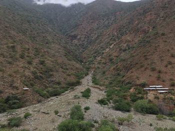 High angle view of road amidst mountains